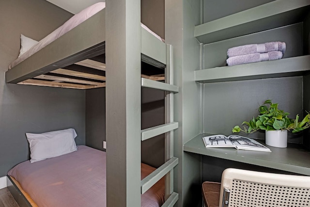 bedroom featuring wood-type flooring