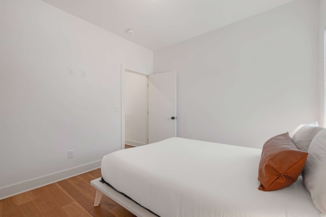 bedroom with light hardwood / wood-style flooring