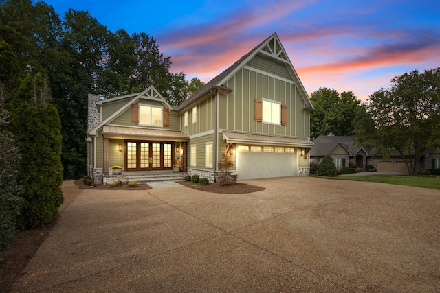 view of front of property with a garage