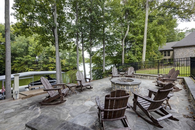 view of patio featuring an outdoor fire pit