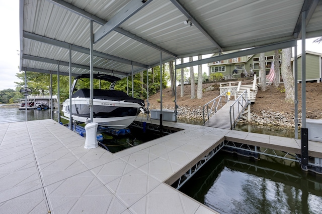 view of dock with a water view