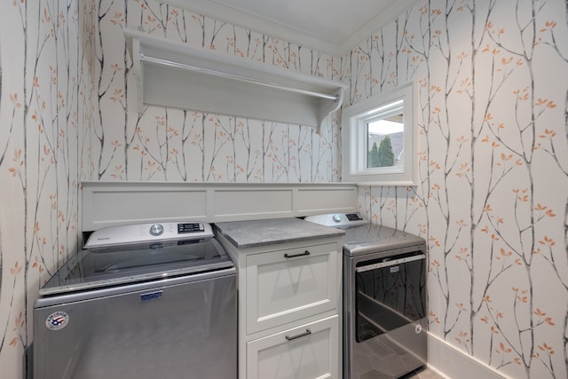 laundry area with cabinets and ornamental molding