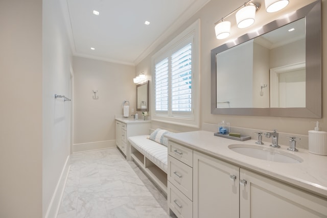 bathroom featuring vanity and crown molding