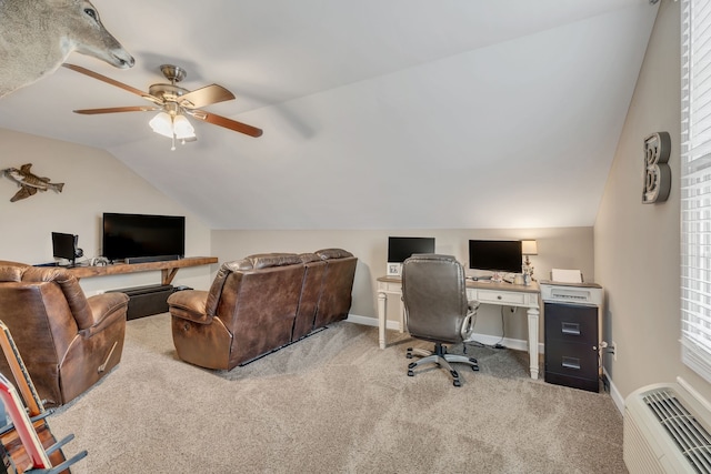 home office with ceiling fan, light colored carpet, and lofted ceiling