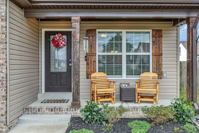 property entrance with a porch