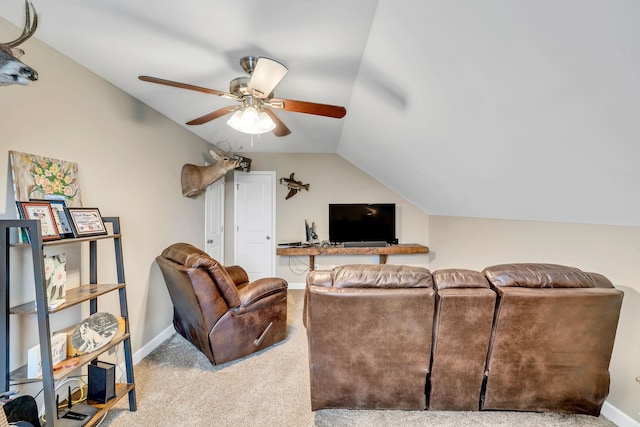 carpeted living room with lofted ceiling and ceiling fan