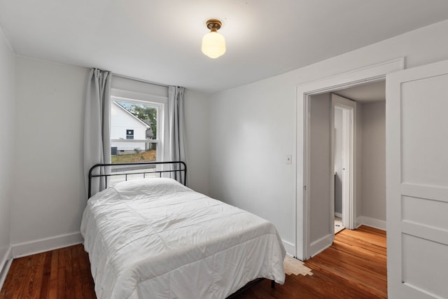 bedroom featuring hardwood / wood-style floors