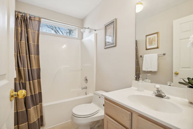 full bathroom with vanity, toilet, and shower / bath combo