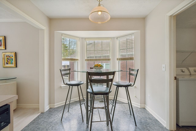 dining area with washer / dryer