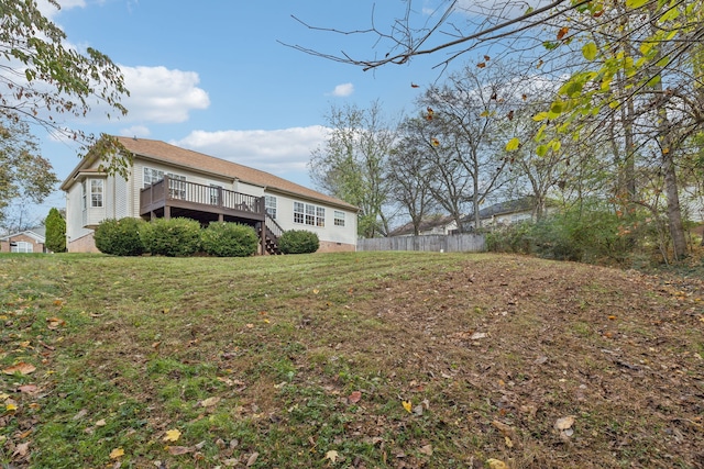 view of yard featuring a wooden deck