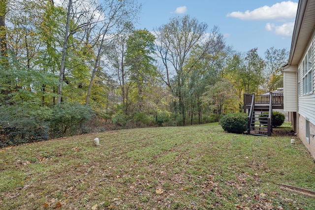 view of yard featuring a deck