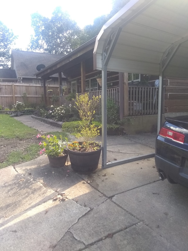 exterior space featuring a carport