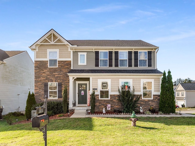 view of front of house featuring a front lawn