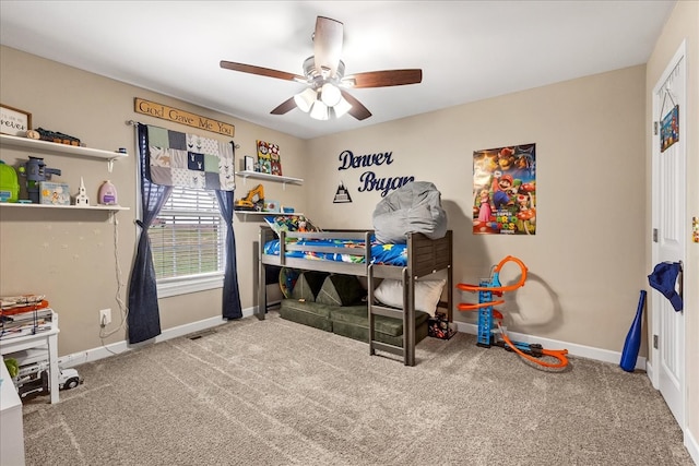 carpeted bedroom featuring ceiling fan