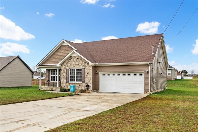 view of front of house with a garage and a front yard