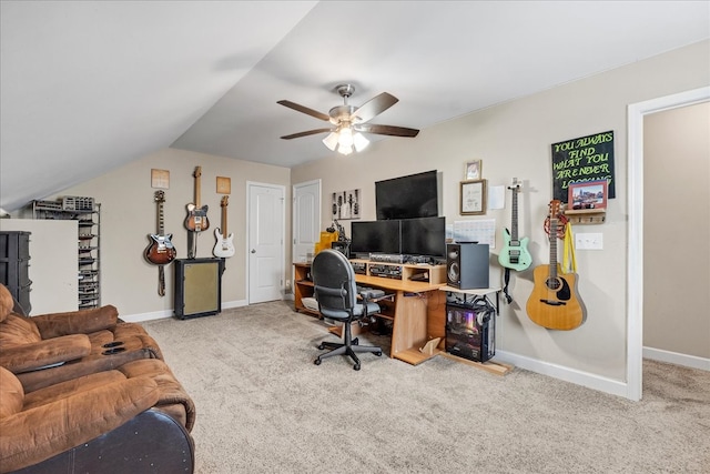 home office featuring light colored carpet, lofted ceiling, and ceiling fan