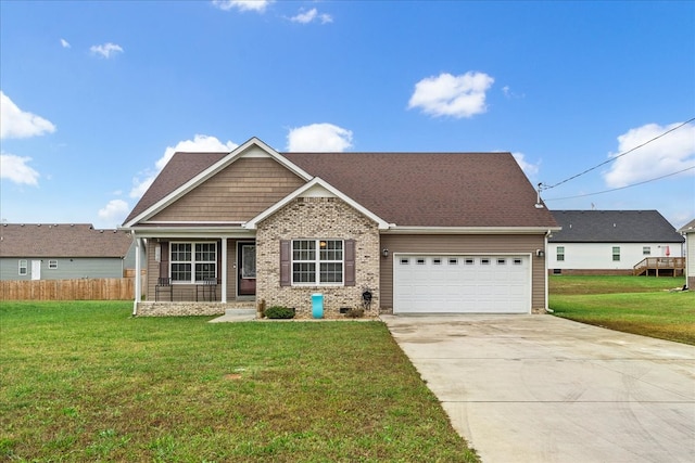 view of front facade featuring a garage and a front lawn