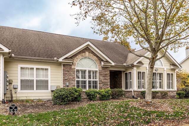 rear view of property with french doors