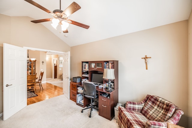 office space featuring high vaulted ceiling, ceiling fan, and light hardwood / wood-style flooring