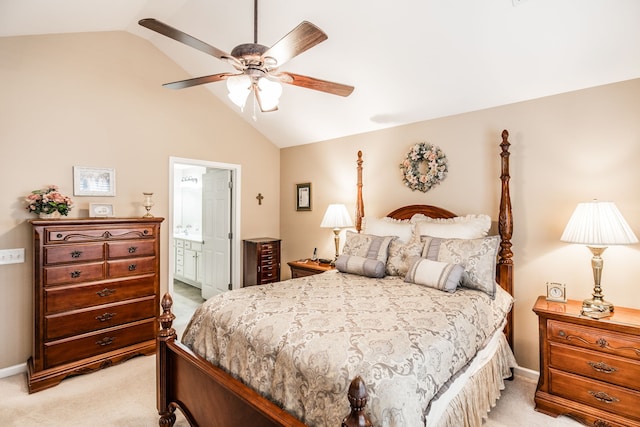 carpeted bedroom featuring lofted ceiling, ceiling fan, and connected bathroom