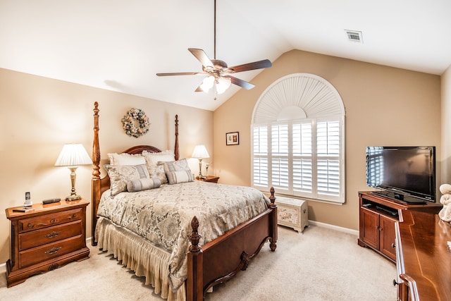 carpeted bedroom with lofted ceiling and ceiling fan