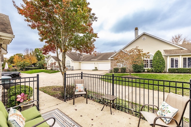 view of patio with a garage