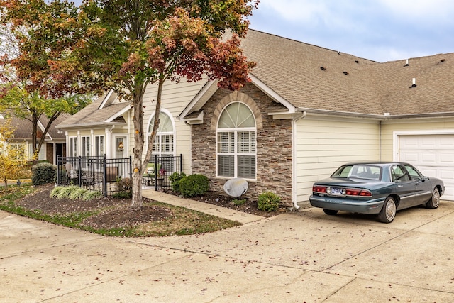 view of front of property featuring a garage