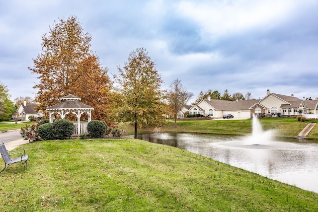 view of yard with a water view and a gazebo