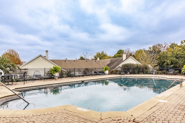 view of pool with a patio