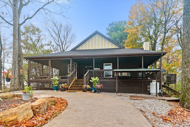 farmhouse featuring a sunroom