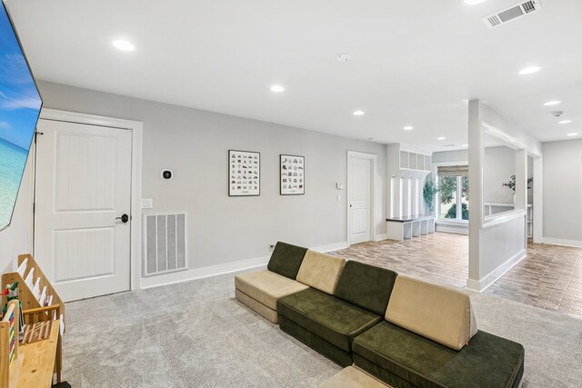 living room featuring light colored carpet