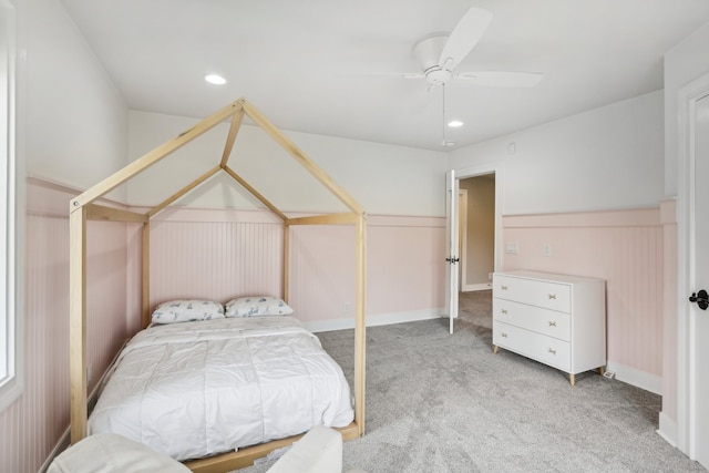 bedroom featuring ceiling fan and light colored carpet