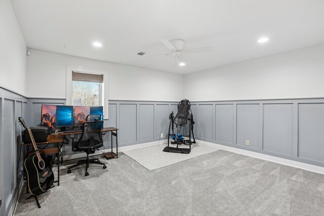 office area featuring light colored carpet and ceiling fan