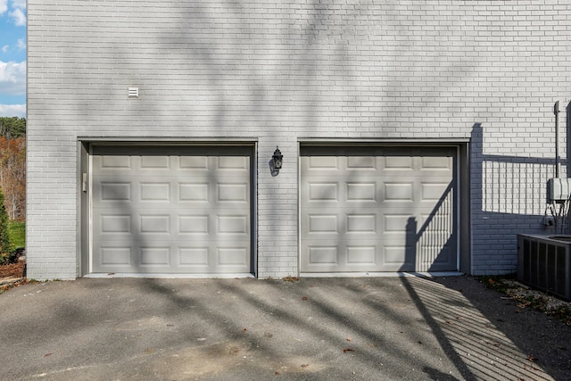 garage featuring central air condition unit