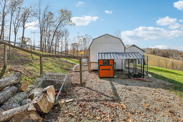 view of outbuilding featuring a rural view