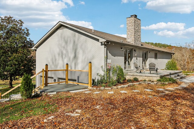 back of property featuring a patio area