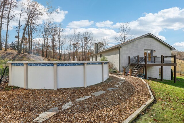 view of yard featuring a pool side deck