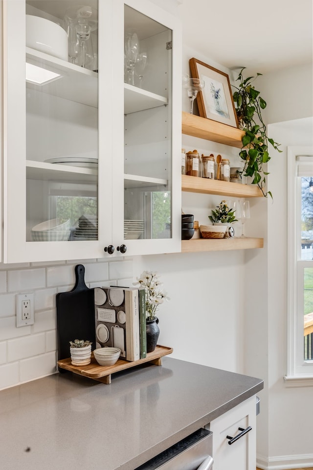 bar featuring white cabinetry