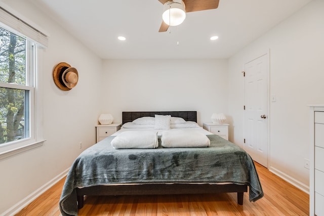 bedroom featuring ceiling fan and light wood-type flooring