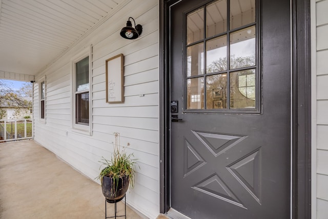 entrance to property with a porch