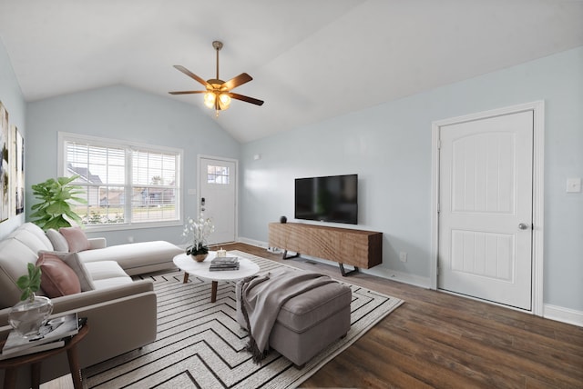 living room featuring lofted ceiling, ceiling fan, and dark hardwood / wood-style flooring