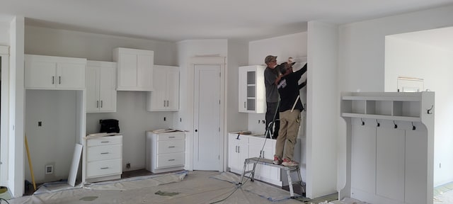 kitchen featuring white cabinets