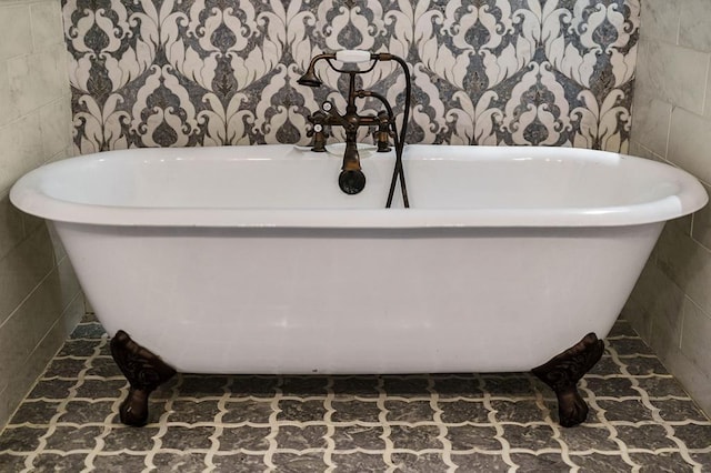 1050 Pine Creek Falls Rd, Smithville, TN 37166 - bathroom featuring a freestanding bath and tile walls