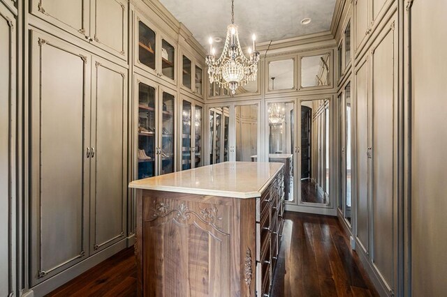 1050 Pine Creek Falls Rd, Smithville, TN 37166 - spacious closet with a chandelier and dark wood-type flooring