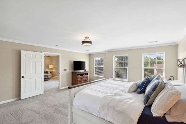 carpeted bedroom featuring ornamental molding