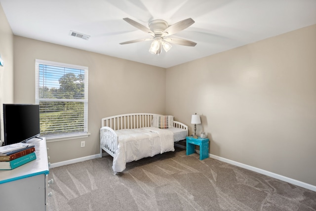 carpeted bedroom featuring ceiling fan