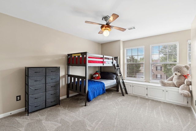 bedroom with light carpet and ceiling fan