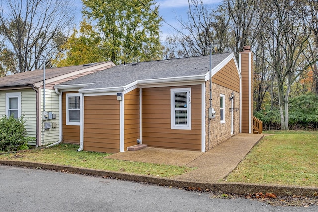 exterior space with a front yard