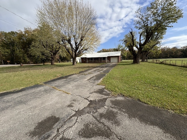 view of yard featuring a garage