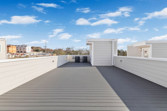 wooden deck with central air condition unit